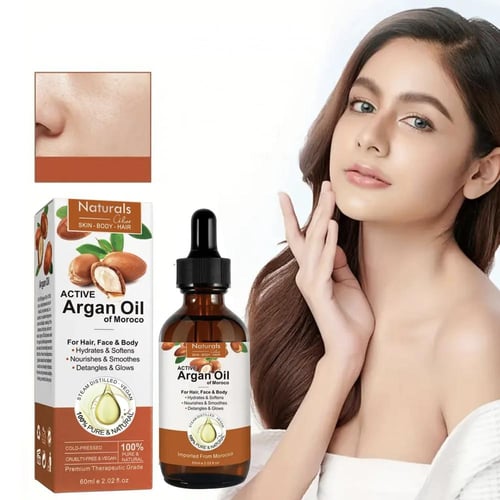 ناتشورال زيت لنمو الشعر والحواجب والرموش بزيت الار...