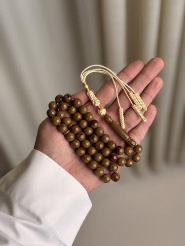 سبحة بكلايت بني شكة ابيض مع ذهبي