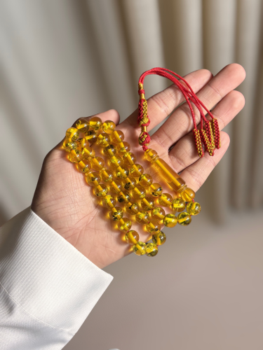 سبحة بكلايت محشرة اصفر شفاف شكه حمراء
