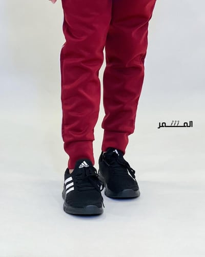 حذاء رياضي - أديداس (اسود مخطط ابيض)