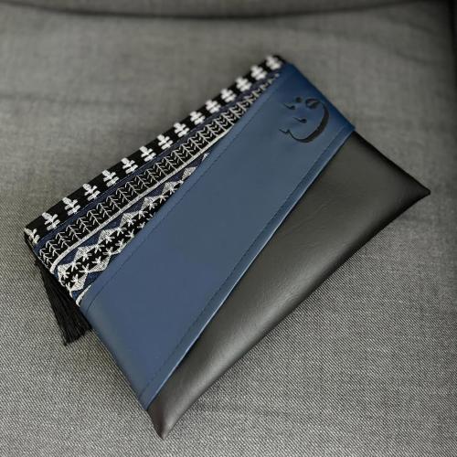 باوتش من الجلد الأسود والكحلي وقماش السدو