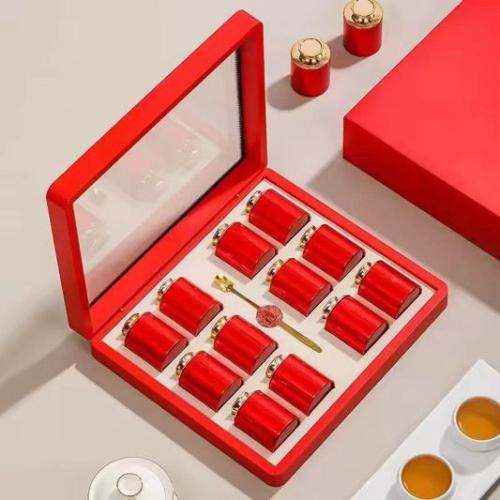 Acrylic box containing luxurious and elegant metal tins
