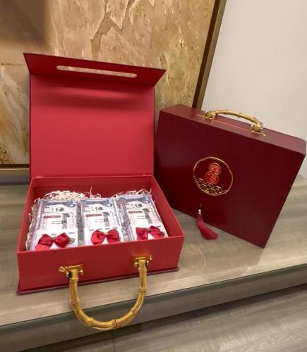 Red box with luxurious design and organized space