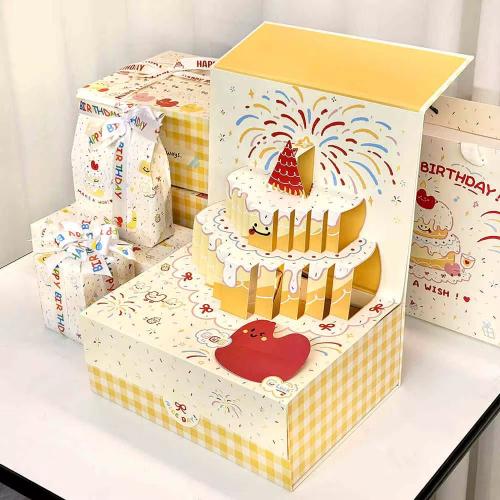 Three-dimensional box with a cake-like design equi...