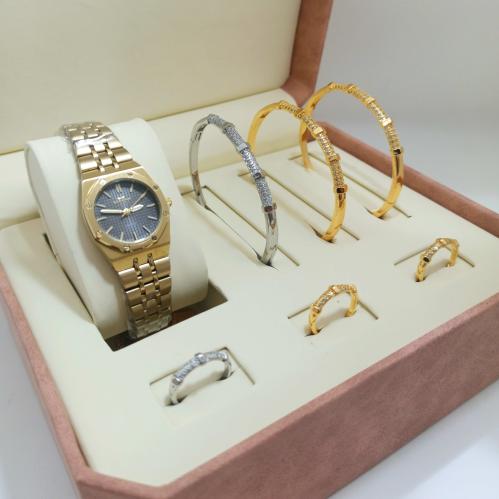 طقم نسائي 3 اساور مع 3 خواتم زركون وساعة فاخرة من...
