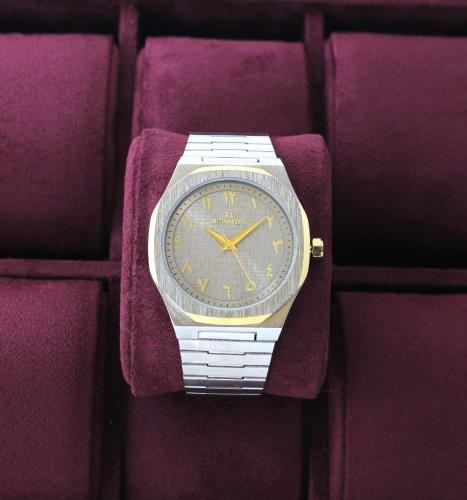 ساعة رجالية فضي ذهبي بعقارب عربية مقاومة للماء وال...