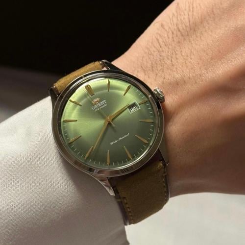 ساعة أورينت - زيتي بجلد مخملي