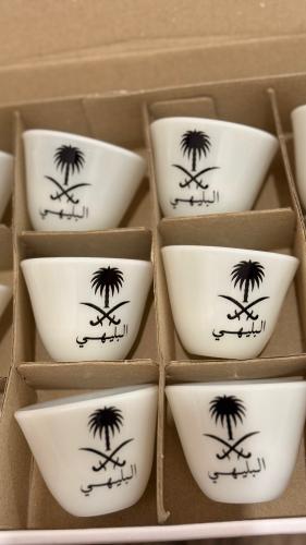12 cups Al-Saif is two swords and a black palm tre...