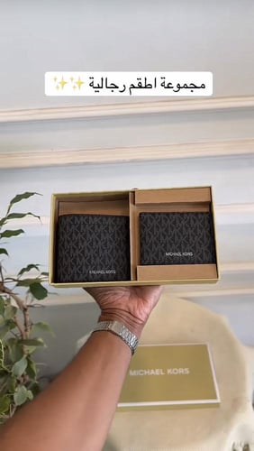محفظة مايكل كورس مع ورد