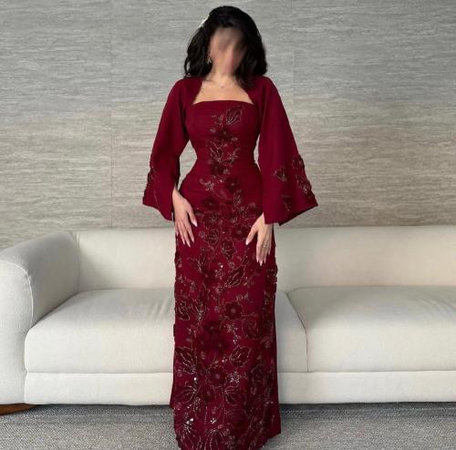 فستان عنابي +تطريز يدوي