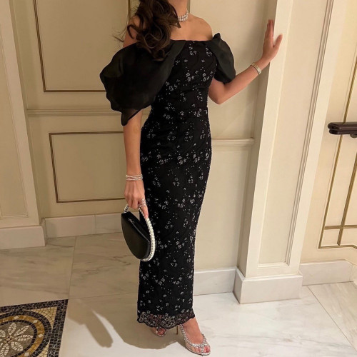 فستان طويل مطرز بتصميم عصري