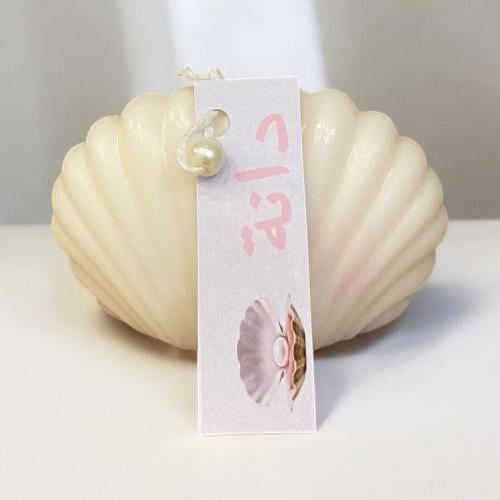 شموع صدفه عطريه بورق مطبوع