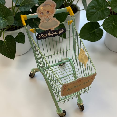 عربة العيديات مع شخصيات كرتونية