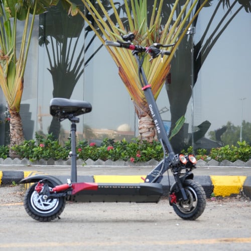 سكوتر الوحش الكهربائي 48 فولت باللونين الأحمر والأ...