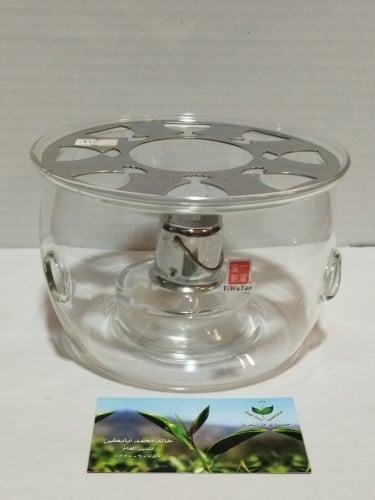 قاعدة زجاج متوسطة جاز ( كيروسين ) او شمع لتسخين ال...