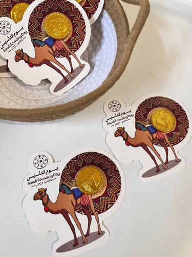 توزيعات جمل مع شوكلاته ذهبية12 حبة