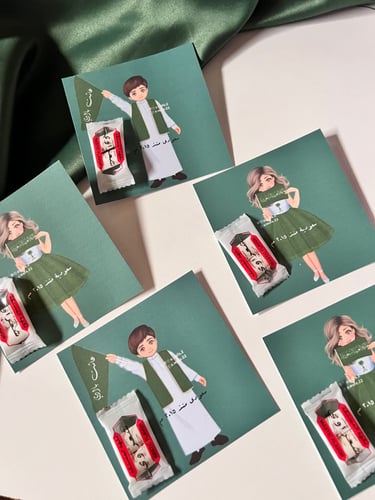 توزيعات اطفال علك ثيم اليوم الوطني