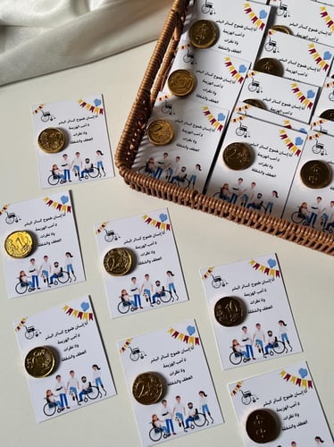 توزيعات اليوم العالمي للاعاقة