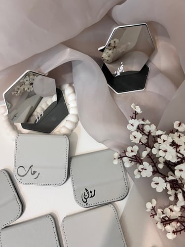 توزيعات مرايا بالاسم