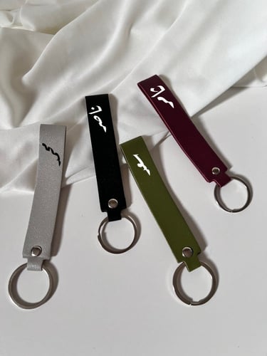 توزيعات ميدالية جلد بالاسم