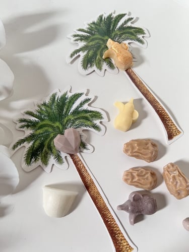 توزيعات شمع فواحة مع ثيم نخلة