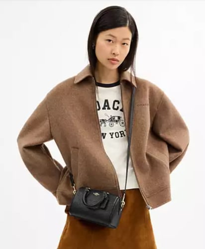 حقيبة كوتش Mini Rowan Crossbody Bag In Signature L...