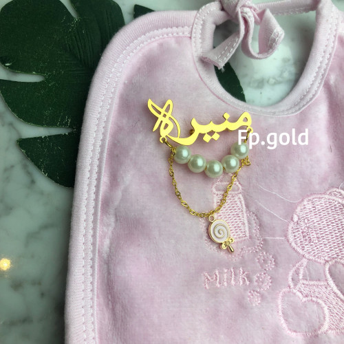 بروش مطلي ذهب مع لولو وسلسله و فص وردي