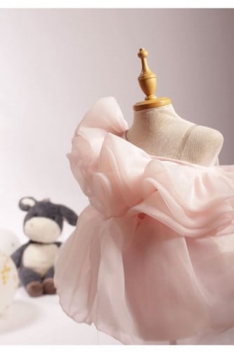 One shoulder dress with tiered bodice and belted waist