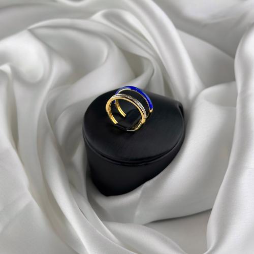 خاتم ذهب اصفر مع لون مينا ازرق ملكي مع فصوص باللون...