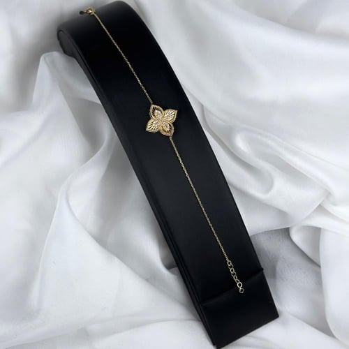 طقم ذهب بتصميم الوردة وفصوص الزركون عيار18