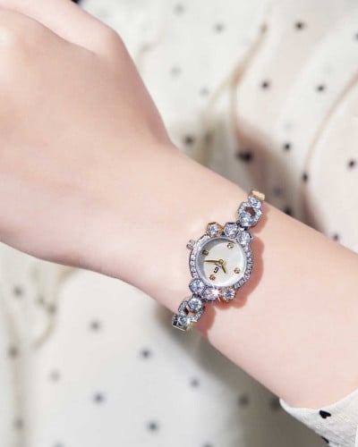 ساعة مها من ستانلس ستيل بلون فضي و ذهبي GBB031F