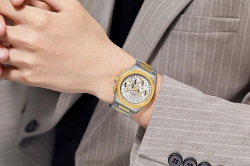 ساعة رجالية قليمير ستيل بلون فضي وذهبي