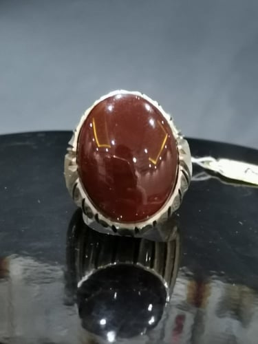 خاتم الفضة بحجر عقيق يماني كبدي بصياغة الأستاذ امي...