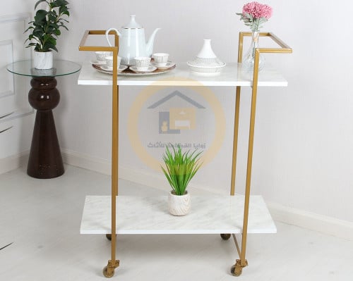 عربية تقديم لون ذهبي 2 دور سطح خشبي لون ابيض شبيه...