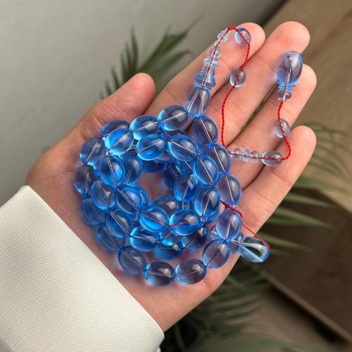 مسباح كاست ازرق شفاف بيضاوي