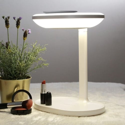 اضاءة مع شاحن لاسلكي ومكبر صوت من موماكس