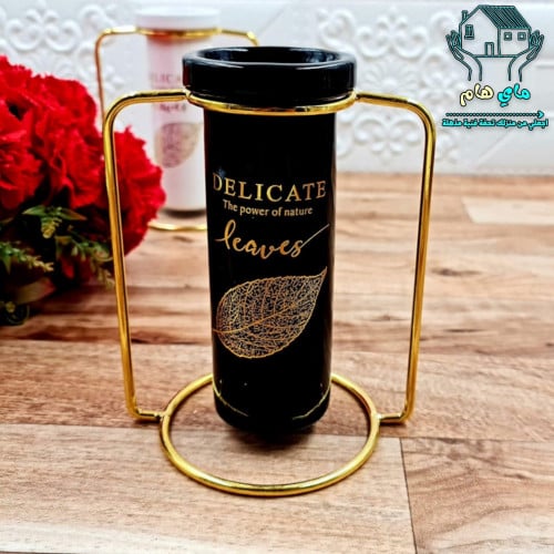 فازة ورود سيراميك أسود بنقش ذهبي مع قاعدة حديد