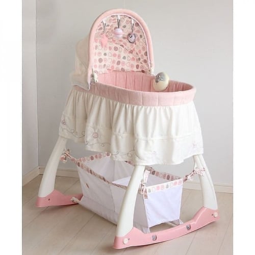 سرير أطفال هزاز متنقل بتصميم جذاب ومظلة فاخرة