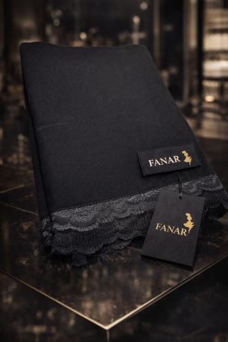 A embroidered headscarf from the edge