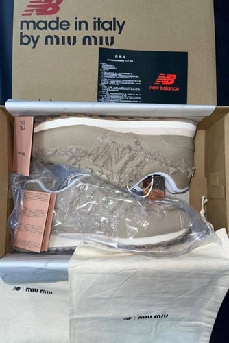 574 New Balance x Miu Miu denim sneakers