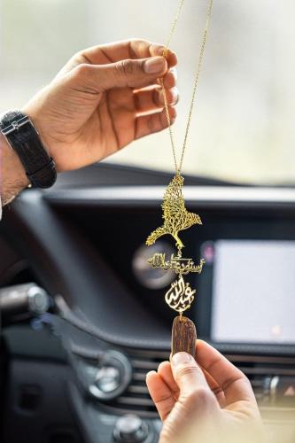 تعليقة رسمة الصقر بالاسم والعود - متجر عهود