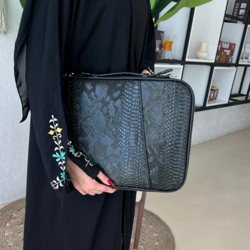 شنطة لابتوب جلد ثعبان