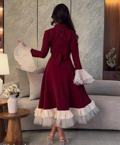 فستان أحمر مطرز بالؤلو