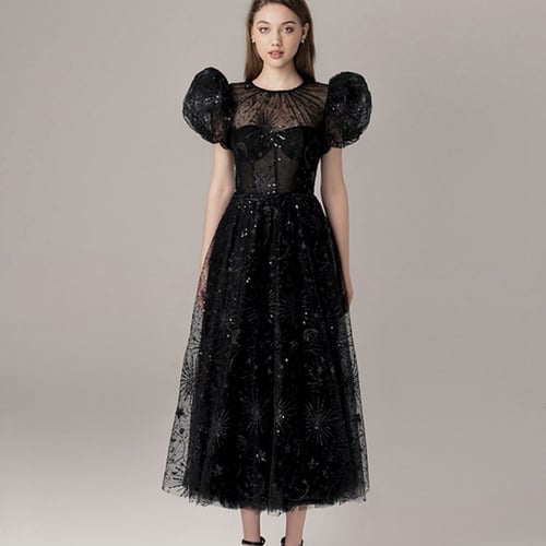 فستان أوربي اسود بلمعه الترتر والزخارف الرائعه