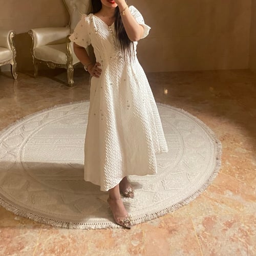 فستان اوربي ابيض بكريستالات أنيقه