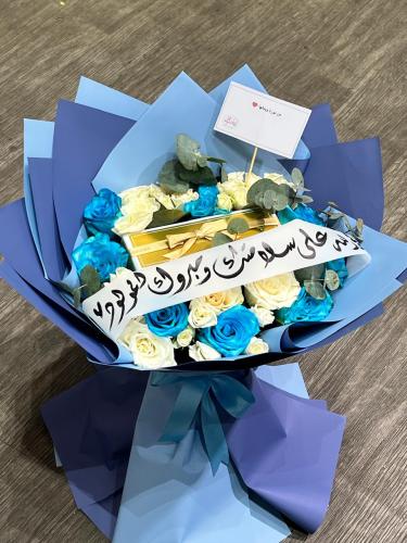 باقة ورد فخمه للمولود مع باتشي شوكولاته