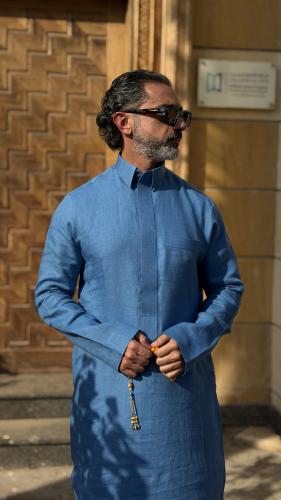 قماش ثياب فيروزي بدون تفصيل