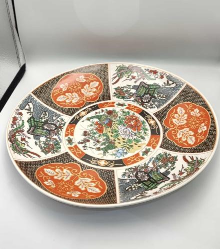 The peacock plate is large - 18 inch