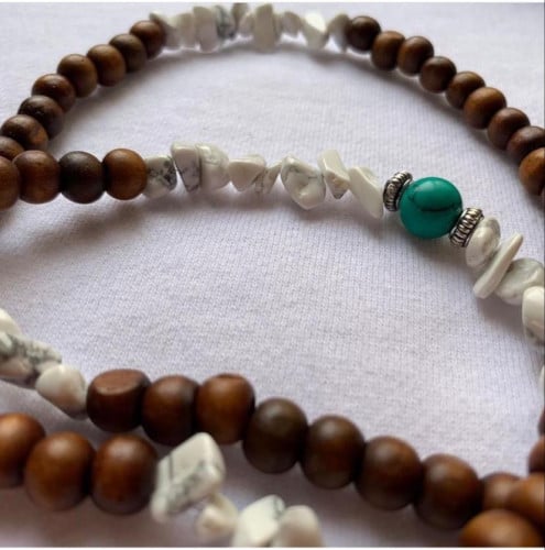 تعليقة جوال ( لون بني بماربل أبيض )