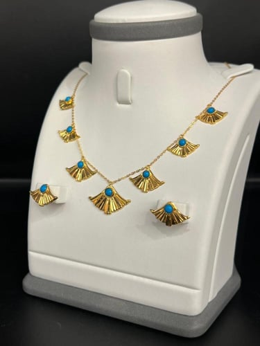 حلق و عقد الفيروزي ذهب عيار21 فاخر و مميز وزن 4.83...